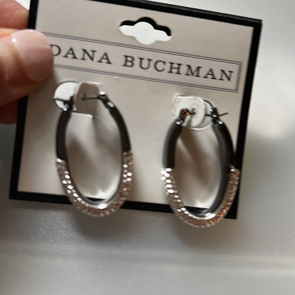 Mesh  detailing brings a contemporary touch to these Dana Buchman hoop earrings.